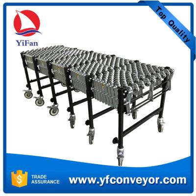 China Heavy Duty Gravity Flexible Steel Skate Wheel Conveyor/Warehouse Loading Unloading Conveyor for sale