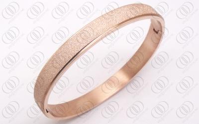 Китай Розовый взорванный песок покрынным, магнитные браслеты ювелирных изделий Bangle нержавеющей стали золота Bangle продается