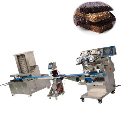 China Automatic Peanut Butter Filled Chocolate Energy Bar Making Machine for sale