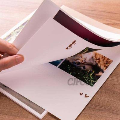 China Custom 157gsm Art Paper Sewing Binding Soft Cover Book Bound Book Printing for sale