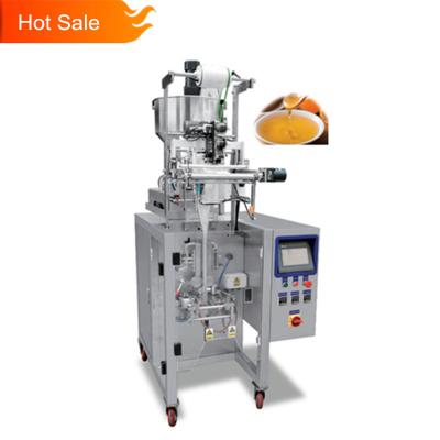 China Automatic PLC Volumetric Vertical Liquid Filling Machine Flow Sachet Sauce Small Size for sale