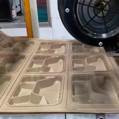 China disposable biodegradable plastic corn starch PLA 3-touch tableware lunch box food container tray plates making machine for sale