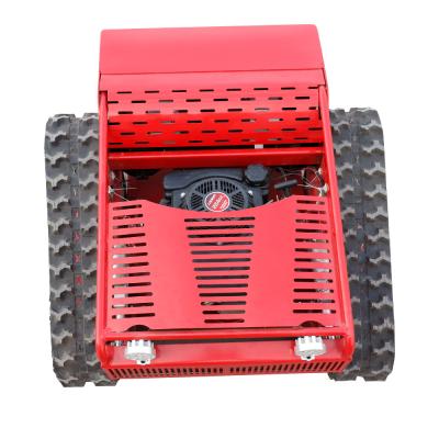 中国 HTM750 Crawler Lawn Mower Hand Opened Remote Control For Tough Terrain Mowing 販売のため