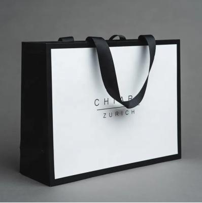 China Reusable Stone Print Paper Bags With Logo And Handles Customized Printed for sale