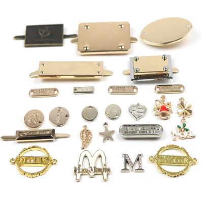 China Eco Friendly Handbag Metal Tags Labels Name Plate Hardware Antirust for sale
