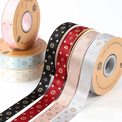 China Silk Screen Printed Polyester Satin Ribbon Other Packaging Products With Gold Foil Stamping Printing for sale