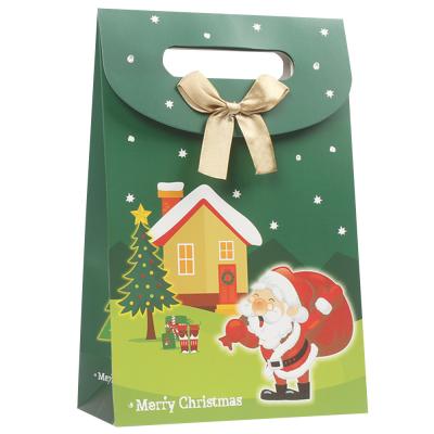 China Printed Gift Packing Paper Bag Green Fancy Boutique Ribbon Christmas Shopping Paper Bag en venta