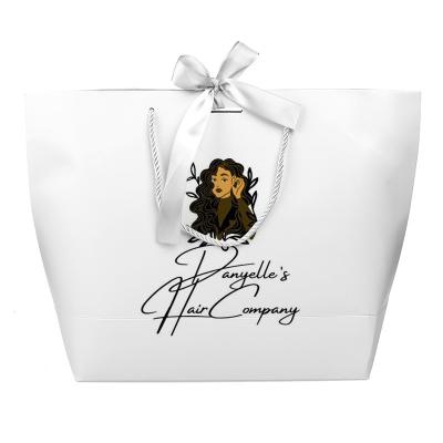 中国 Eco Friendly Gift Packing Paper Bag Jewelry Packaging Luxury Paper Bag With Handle 販売のため