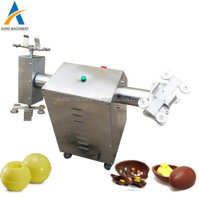 China Hollow Chocolate Spinning Machine Electrical Chocolate Molding Machine for sale