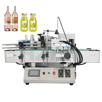 China Automatic Table Type Small Essential Oil Round Bottle Sticker Labeling Machine en venta
