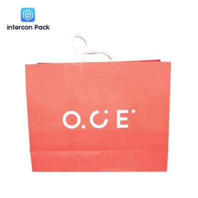 China Matt Lamination Kraft Paper Shopping Bags Custom Orange Portable Reusable for sale