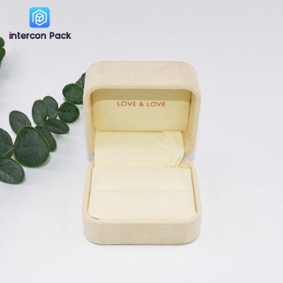 China Flip Small Jewelry Packaging Boxes Polyurethane Flocking Cloth Clamshell Jewelry Box for sale