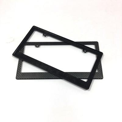 China 4 Hole Carbon Fiber License Plate Frame Motorcycle Thin US Standard for sale