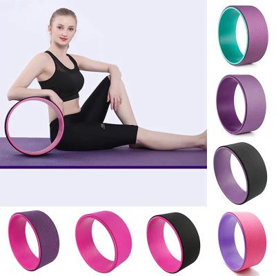 China Colorful Beginner Yoga Wheel , Yoga Back Roller Wheel With Thick Padding for sale
