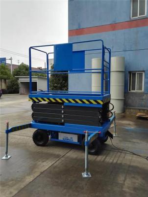 China Solid Tyre Wheel Skidproof Checkered Platform Aerial Hydraulic Mobile Scissor Lift for sale