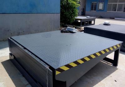 China 10T Electric Loading Capacity Truck Warehouse Dock Leveller With 2000*2500mm Size for sale