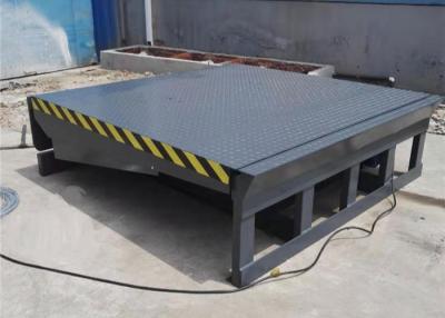 China Safety Electric Hydraulic Warehouse Dock Levelers 10 Ton 2 Piece Bumper Block Protection for sale