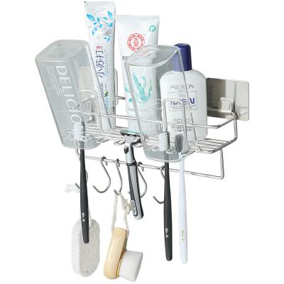 China Creative Sustainable Stainless Steel Toothbrush And Toothpaste Shelf Storage Rack Organizer Holder For Bathroom for sale
