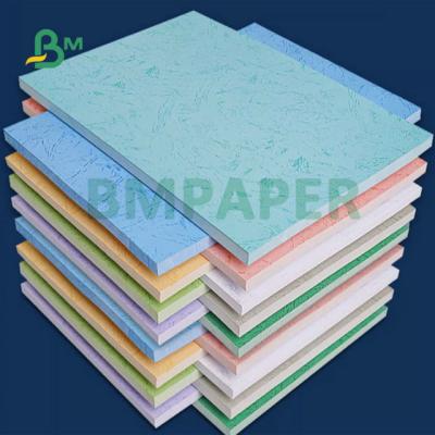 Chine Vert bleu rouge 230gm 260gm cuir texturé papier en relief pour couvertures de livres 31x43 pouces à vendre