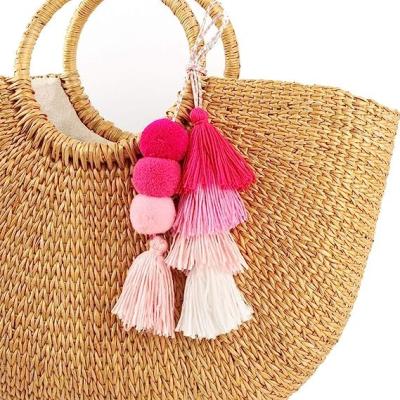 China Colorful Bohemian Pompom Tassel Keychain Handbags Straw Bag Charms Ornaments Key Ring Pompom Pendant for sale