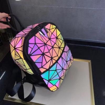 China Geometric Rhombic Luminous Color-Changing Material Student Schoolbag Korean Version Male And Female Couple Backpack for sale