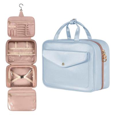 China Custom Logo Foldable Portable Storage Pink Cosmetic Bags Makeup Organizer Travel Hanging Toiletry Bag for sale