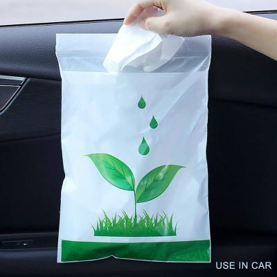 China Biodegradable Disposable Car Trash Bags PLA Self Adhesive Portable Leak Proof Vomit Bags White Cartoon Trash Bags for sale
