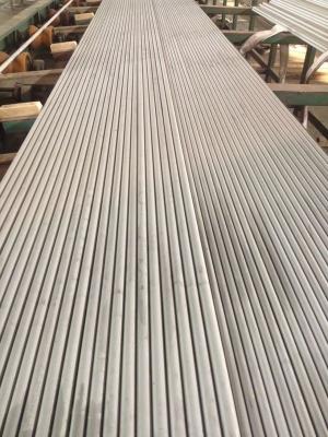 China Aluminio 1100 recocido L tubos aletados con estrías con grueso de la aleta de 0.45m m en venta