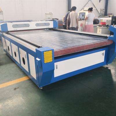 China 1626 auto feeder laser engraving cutting machine for cloth/garment/textile/fabric for sale
