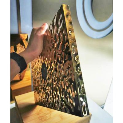Chine Couleur dorée feuilles d'acier inoxydable miroir grosse vague d'eau 201J1 revêtement mural de nid de miel à vendre