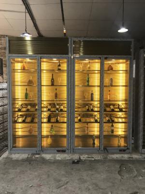 China O projeto que refrigera a exposição de aço tainless submete armário do vinho da exposição do vidro do uísque da adega de vinho da parede luxuosa o grande à venda