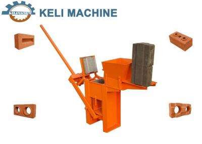 China Hand Press Small Manual Clay Interlocking Brick Making Machine zu verkaufen