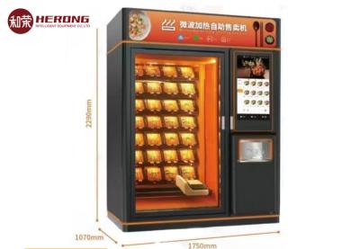 China 220V Vending Machine Kiosk Refrigerated Microwave Heated Cafeteria Orange Black Smooth Delivery en venta
