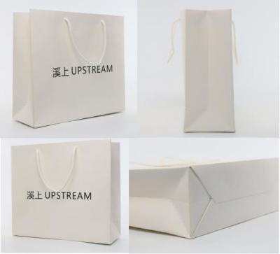 中国 ISO9001 Custom Logo Paper Bags White Paper Craft Bags With Handles Gravure Printing 販売のため