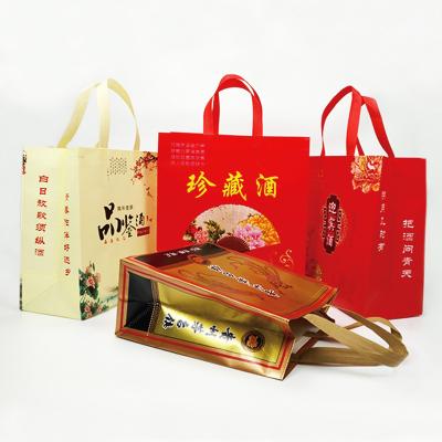 China Waterproof Custom Printed Logo Gift Wrapping Tote Bags Die Cut Handle Holder Single Wine Bottle Bag for sale