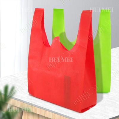 China 25gsm Biodegradable Non Woven T Shirt Bag Shrink Resistant for sale