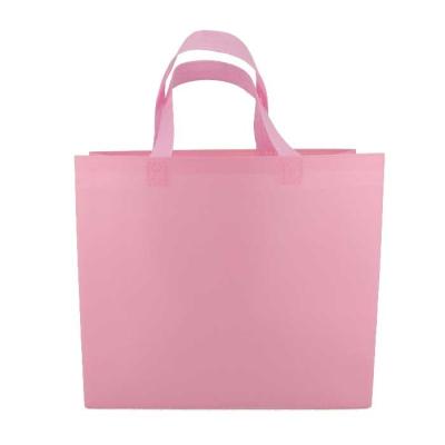 China Grocery Printed Non Woven Shopping Bags Pink 65gsm Breathable Shrink Resistant for sale