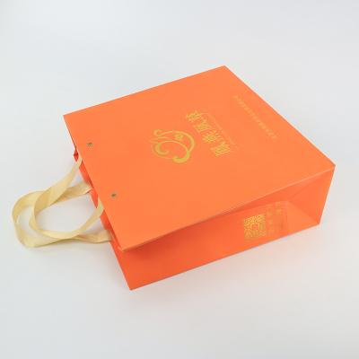 China Glossy Branded Shopping Gift Custom Logo Paper Bags With Rope Handles for sale