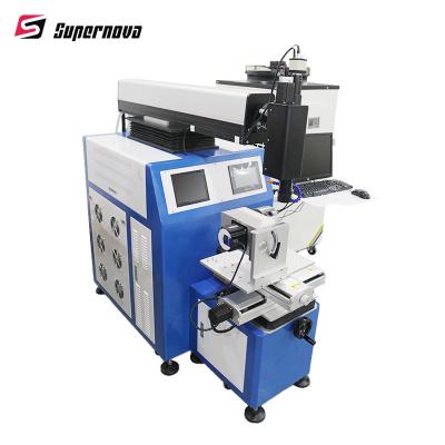 China DMA Automatic Laser Welding Machine Rotary Clamp Laser Welding Equipment for sale