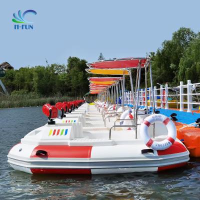 China Inflatable outdoor water play equipment bumper boat electric pedal boat water play equipment à venda