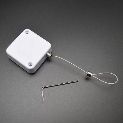 China Anti theft security tether steel cable retractable pull reel box  anti-theft pull box for sale