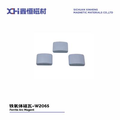 China Magnetos de segmento de arco de solo úmido Magnético permanente Ferrite para motor universal W2065 à venda