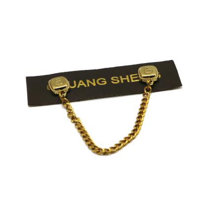 China Logo Patches For Clothes de cuero de encargo dorado con la cadena los 7.5cm×2cm del metal del oro en venta
