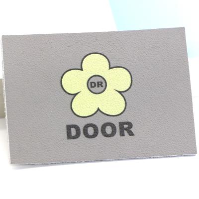 China OEM Gray Leather Patch For Jeans Printing Flower Pattern 7cm×5cm for sale