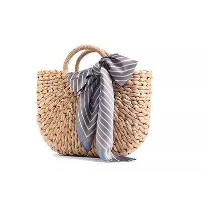 China Round Wrist Beach Woven Bag , Handmade Crochet Handbags Corn Skin Material ODM for sale