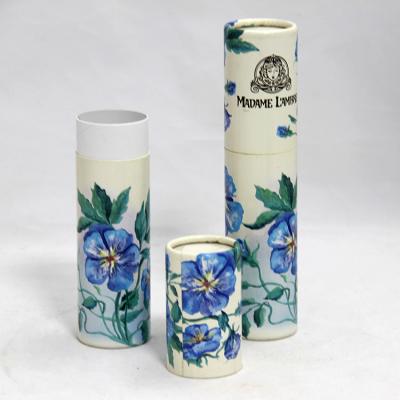 China Luxury Package Blue Flower Design Hot Paper Cans Packaging Inside With Plastic Jar for sale