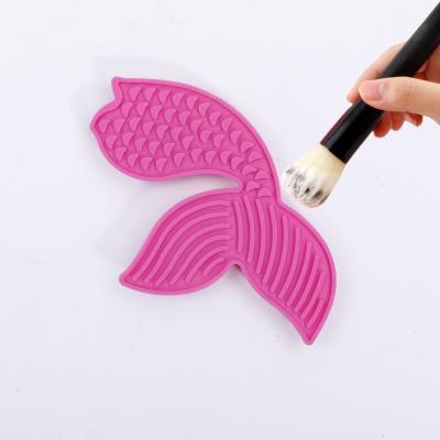 China Color Cleaner Make Up Brushes Silicon Mat Fishtail Makeup Brush Cleaning Pad for sale