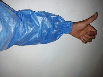 China Prenda impermeable disponible tejida no- de las mangas del brazo del SMS con el puño elastificado adicional en venta