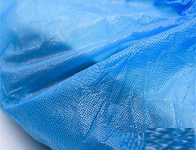Chine La chaussure jetable bleu-clair couvre résistant liquide de couture Elasticized de bande de roulement texturisée à vendre