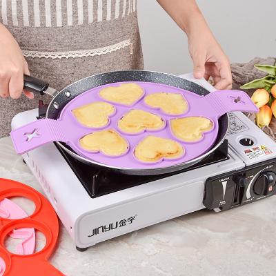 China Amazon Product Viable Kitchen Cooking 7 Circles Non Stick Fried Pancake Silicone Egg Mold Shaper Mold Maker Cavity Egg Mold for sale